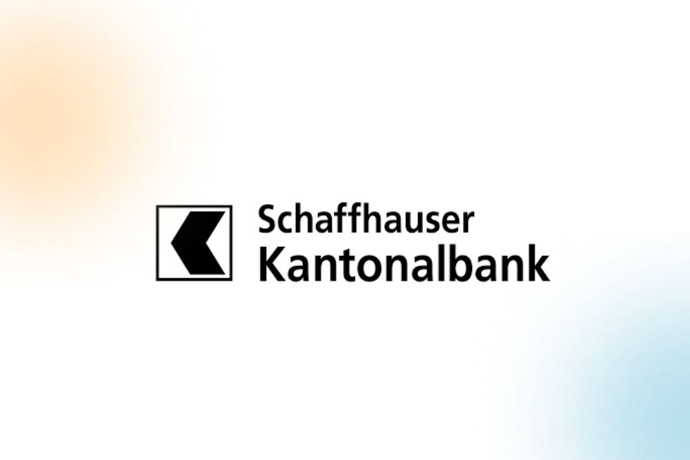 Logo of Schaffhauser Kantonalbank on a white background with an orange and a blue blurred style element in the background