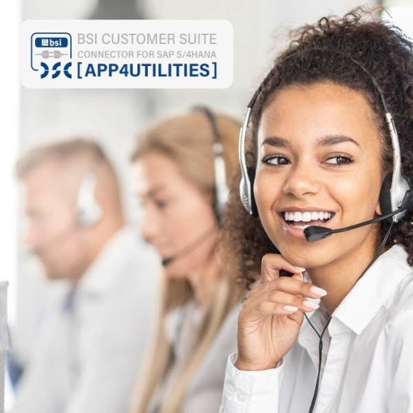 Smiling customer service representatives with headsets – symbolic image for the use of the BSI Customer Suite and SAP S/4HANA connector in the energy and utilities sector