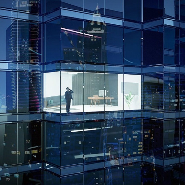 Modern office floor in a glazed high-rise building at night - Broker on the phone in the context of Broker Relationship Management with BSI Software.